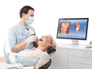 Dr. with a patient for teeth Cleaning & Dental Checkups
