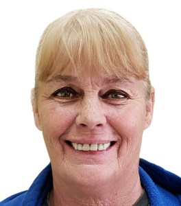 Picture of a woman smiling for the smile gallery after  treatment